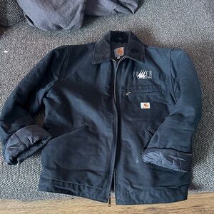 Heavy duty Carhartt cuorduroy collar work jacket.
